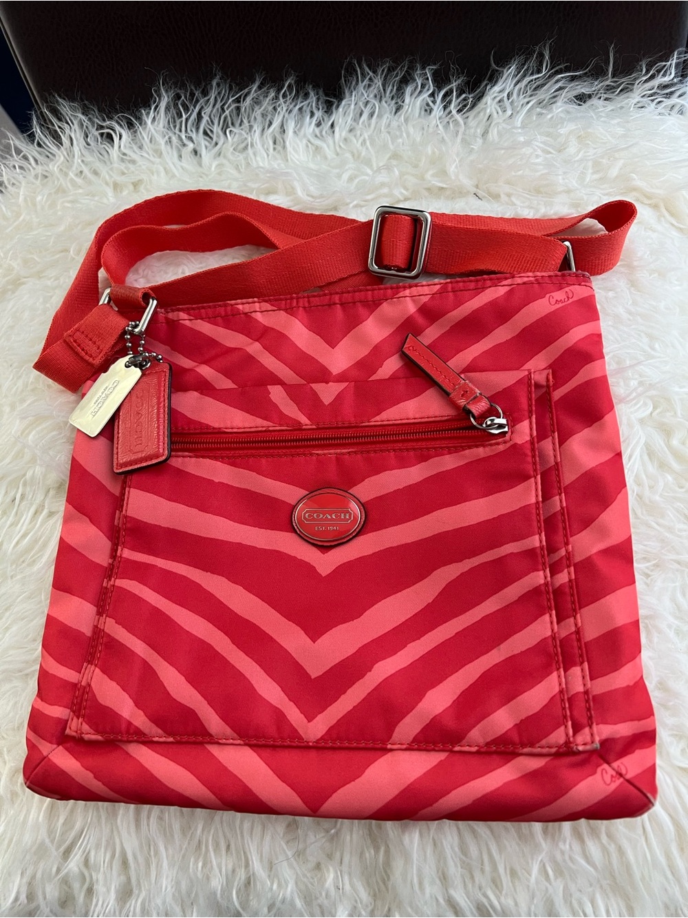 Coach Getaway Zebra Print Nylon
File Crossbody Bag